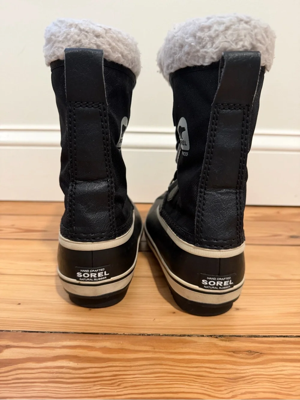 Sorel Black Kids' Snow Boots with Faux Fur